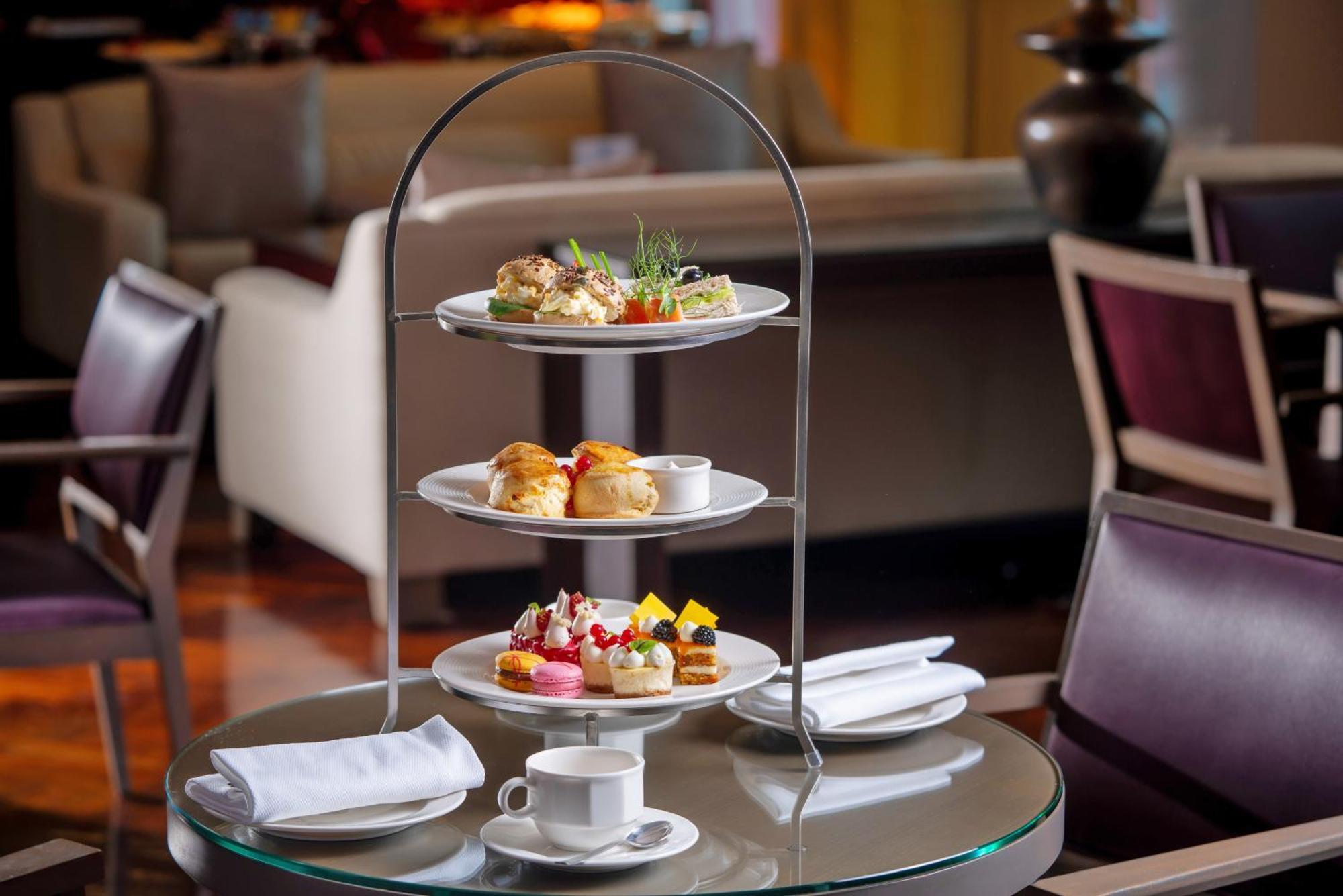 Hotel Park Rotana Abu Dabi Exterior foto Afternoon tea at the Emirates Lounge at Dubai International Airport